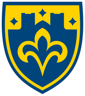 St. Scholastica logo
